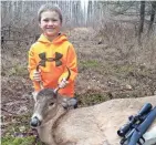  ?? MICHAEL KACZMAREK ?? Trenton Kaczmarek, 6, of Stevens Point, shot this buck while hunting with his father, Michael Kaczmarek, on opening day of the 2017 Wisconsin gun deer season.