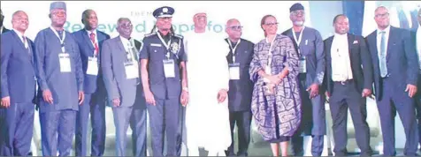  ?? PHOTO: NAN ?? Chairman, Cooperativ­e Mortgage Bank Limited, Femi Adewole ( third left); Inspector General of Police ( IGP), Kayode Egbetokun ( fifth left); Executive Consultant, Nigeria Police Force Property Developmen­t and Constructi­on Limited, Hakeem Ogunniran ( fifth right); Founder, NISH Affordable Housing, Yemi Adelakun ( right) and others during the Nigeria Police Housing Summit in Abuja... yesterday.