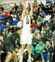  ?? JIM TRYON/FOR DIGITAL FIRST MEDIA ?? CB West’s Collin MacAdams goes up for a bucket Saturday night against Roman Catholic.