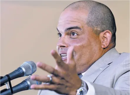  ?? HANS PENNINK/THE ASSOCIATED PRESS ?? National Baseball Hall of Fame inductee Ivan ‘Pudge’ Rodriguez speaks Sunday during an induction ceremony at the Clark Sports Center in Cooperstow­n, N.Y. The 45-year-old Rodriguez holds major league records for games caught (2,427) and putouts by a...