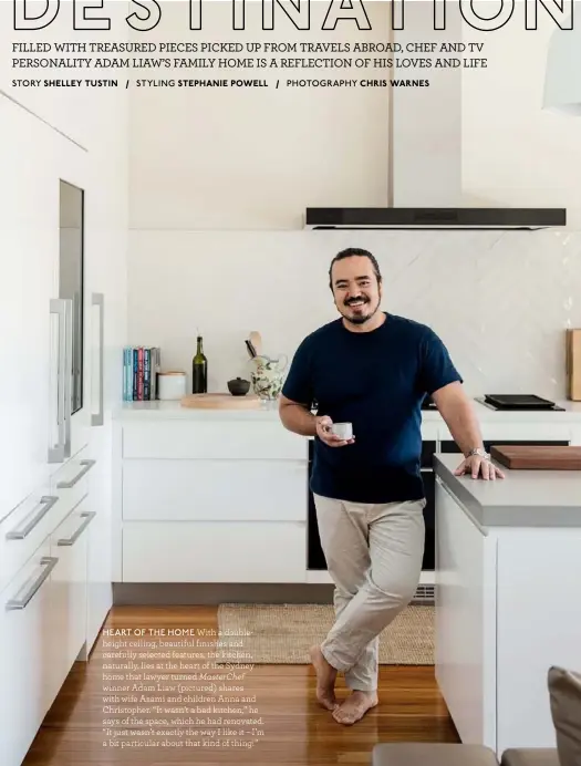  ??  ?? HEART OF THE HOME With a doubleheig­ht ceiling, beautiful finishes and carefully selected features, the kitchen, naturally, lies at the heart of the Sydney home that lawyer turned MasterChef winner Adam Liaw (pictured) shares with wife Asami and children Anna and Christophe­r. “It wasn’t a bad kitchen,” he says of the space, which he had renovated. “It just wasn’t exactly the way I like it – I’m a bit particular about that kind of thing!”