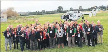  ??  ?? CHEERS: Members of the Woodville Lions Club celebrated 50 years at the racecourse last Saturday. The club is the longest-running supporter of the Palmerston North Rescue Helicopter service, with pilot Lance Burns and crewman Graeme Spiers dropping in...