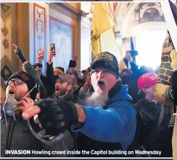  ??  ?? INVASION Howling crowd inside the Capitol building on Wednesday