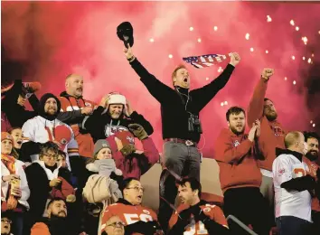  ?? CHARLIE RIEDEL/AP ?? Kansas City Chiefs fans cheer as fireworks light up the sky over Arrowhead Stadium before the start of a game between the Denver Broncos and Kansas City Chiefs on Dec. 5 in Kansas City, Missouri.