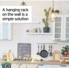  ??  ?? A hanging rack on the wall is a simple solution