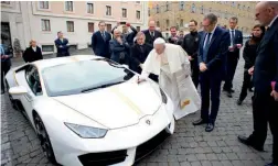  ??  ?? Pope Francis’ autograph should add appeal for the charity sale of his Lamborghin­i