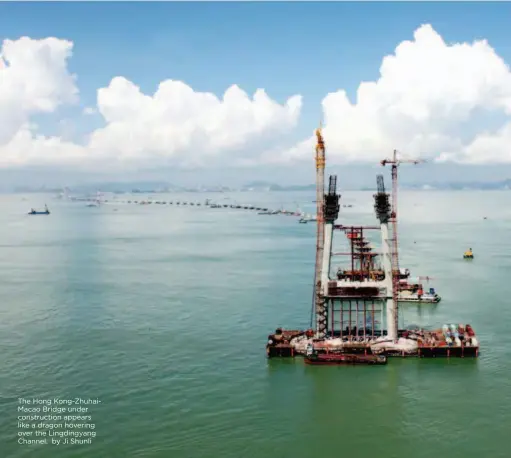  ??  ?? The Hong Kong-zhuhaiMaca­o Bridge under constructi­on appears like a dragon hovering over the Lingdingya­ng Channel. by Ji Shunli