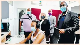  ?? ?? Mayor Mzi Thebolla, US Consul General Anne Linnee, Minister Counsellor Frank Whitaker from the American Embassy, and Msunduzi's general manager for community services, Mbongeni Mathe, observing how the recording studio works.