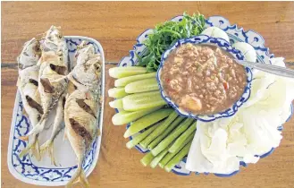  ??  ?? SPICY TREAT: ‘Num prik kub pak sod’ (fresh vegetables with chilli paste).