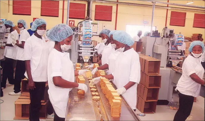  ??  ?? Youths at work in Belloxxi Industries Limited, Agbara