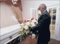 ?? WILFREDO LEE/AP ?? Owning a funeral home took some getting used to, Hall of Famer Andre Dawson said Thursday, and now he’s adjusting to life as a mortician during a global pandemic.