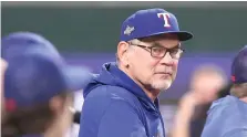  ?? ?? Texas Rangers manager Bruce Bochy watches batting practice Tuesday before Game 3 of the baseball team's AL Division Series against the Baltimore Orioles in Arlington, Texas. (AP photo/lm Otero)