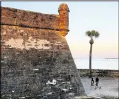  ?? JOE BURBANK/ ?? The Castillo de San Marcos, the old fort, is shown at sunset in St. Augustine, Fla.