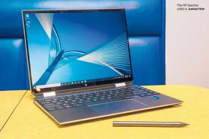  ?? SARAH TEW ?? The HP Spectre x360 14.
The Lenovo Yoga 9i. JOSH GOLDMAN/ CNET