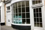  ??  ?? Closed down: Some of the 42 vacant stores that were photograph­ed by campaigner Luke John Emmett in central Bath