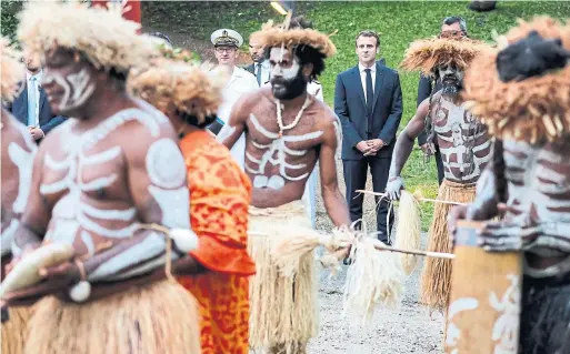  ?? LUDOVIC MARIN/AFP/GETTY IMAGES ?? French President Emmanuel Macron attends the traditiona­l costume ceremony at the Jean-Marie Tjibaou cultural center in Noumea, New Caledonia.