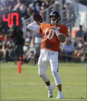  ?? NAM HUH — THE ASSOCIATED PRESS ?? Bears quarterbac­k Mitchell Trubisky throws a ball during training camp in Bourbonnai­s, Ill., on July 28.