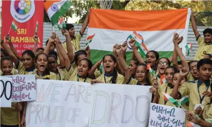  ??  ?? Indian children celebrate after the successful anti-satellite missile test this week. Photograph: Sam Panthaky/AFP/Getty Images