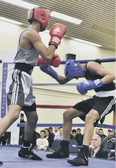  ??  ?? Ali Hassan (right) beat Abdul Samad on points.