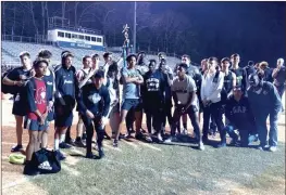  ?? Photos by ALEX FARRER and FRANK CROWE / For the Calhoun Times ?? ( The Calhoun girls (left) and Calhoun boys (right) pose for pictures with their County Championsh­ip first-place trophies on Wednesday night at Gordon Central. ( Calhoun’s Felipe Barrios (left) leads (from left) Sonoravill­e’s John Graves, Calhoun’s...