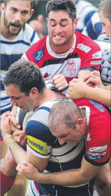  ?? Picture: Grant Melton FM4491218 Buy this picture from kentonline.co.uk ?? Maidstone get to grips with Tunbridge Wells. Left, Maidstone’s Brendan Trudgen goes over for a try