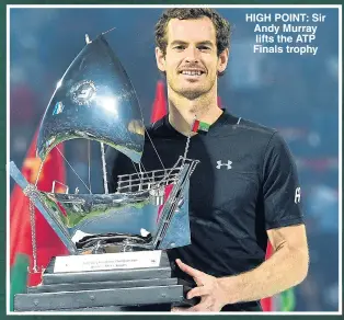  ??  ?? HIGH POINT: Sir Andy Murray lifts the ATP Finals trophy
