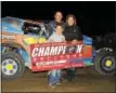  ?? RICK KEPNER - FOR DIGITAL FIRST MEDIA ?? Boyertown’s Ryan Watt, joined in victory lane by wife Lori and son Logan, was crowned STSS South Region champion on Oct. 28 at Georgetown Speedway in Georgetown, Del.