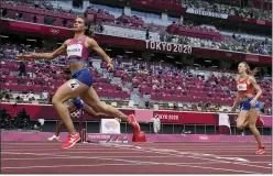  ?? PETR DAVID JOSEK — THE ASSOCIATED PRESS ?? Sydney McLaughlin, of the United States, wins the women’s 400-meter hurdles final at the 2020 Summer Olympics, Wednesday, Aug. 4, 2021, in Tokyo, Japan.