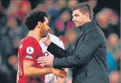  ?? ?? Liverpool forward Mo Salah (left) and Aston Villa coach Steven Gerrard at Anfield on Saturday.