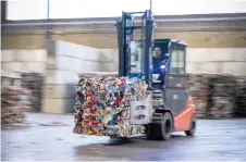  ?? ?? A worker sorts plastic at Site Zero’s recycling facility in Motala, Sweden.