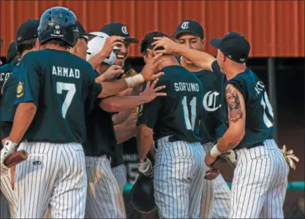  ?? ADRIANNA LYNCH — FOR DIGITAL FIRST MEDIA ?? Chadwick’s Joseph Sortino is congratula­ted by his teammates after his home run against JP Mascaro Wednesday.