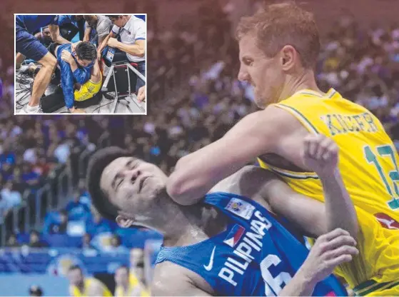  ?? Pictures: FIBA TELECAST/TWITTER ?? Australia’s Daniel Kickert elbows opponent Roger Pogoy and (inset) Chris Goulding is attacked by a Philippine­s squad member.