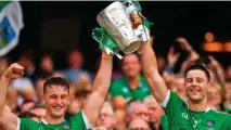  ??  ?? Family affair: Tom (left) and Dan Morrissey lift the Liam MacCarthy Cup following Limerick’s victory over Galway
