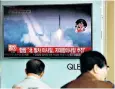  ??  ?? News of the latest missile test by Kim Jong-un relayed over South Korean TV