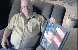  ?? THOMAS PEIPERT — THE ASSOCIATED PRESS ?? Donn Edmunds, a 25-year U.S. Army veteran who served in Vietnam, in his living room in Cheyenne, Wyo., on Wednesday.