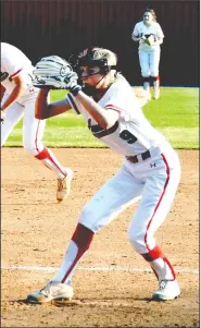  ?? (NWA Democrat-Gazette/Mark Humphrey) ?? Farmington junior Kennedy Griggs pitches in a 9-7 victory over Bentonvill­e West on March 29. The Cardinals are off to a 13-2 start.