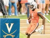  ?? AP FILE ?? Wide receiver Lavel Davis Jr., above, was one of three Virginia football players killed in a shooting Sunday night. The others were D’Sean Perry and Devin Chandler.