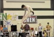  ?? STAN HUDY - SHUDY@DIGITALFIR­STMEDIA.COM ?? Shenendeho­wa senior diver Nick Lydon comes out of a tuck and flip ready to hit the surface of the Shenendeho­wa Aquatics Center pool Thursday night in his final dive at the Section II diving championsh­ip. Feb. 15, 2018.