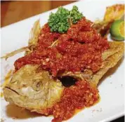  ??  ?? Crunchy: Ikan Goreng Cili topped with chilli.