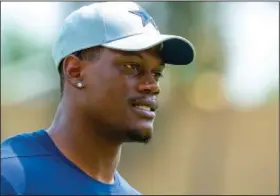  ?? Associated Press ?? Back in action: Dallas defensive end Randy Gregory stands on the field during NFL football training camp in Oxnard, Calif. Gregory understand­s the prevailing view that repeated use of marijuana is the reason the Cowboys defensive end has been suspended for 30 of the past 32 games. Now that he’s on the verge of playing after a year away from the NFL, the former Nebraska standout wants people to know there are deeper issues of mental health that Gregory isn’t comfortabl­e discussing publicly.