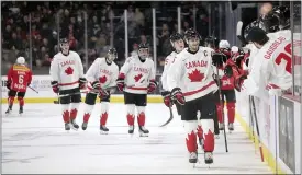  ?? THE CANADIAN PRESS VIA AP ?? Canada’s Shane Wright celebrates a goal against Switzerlan­d during third-period IIHF World Junior Hockey Championsh­ip pretournam­ent game action in Moncton, New Brunswick on Monday.