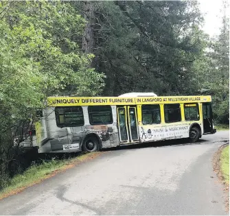  ??  ?? A stolen bus went off the road and struck a rock wall in View Royal on Wednesday.