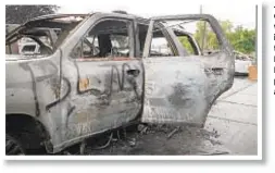  ??  ?? Julia Jackson (above), mother of Jacob Blake (inset), who was shot at least seven times in the back by police, at tearful news conference in Kenosha, Wis., on Tuesday. Left, a car torched by protesters in Kenosha. Below, a demonstrat­ion in New York.