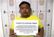  ??  ?? PNP-IMEG photo shows the arrested policeman Charlito Tinoy.