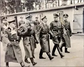  ?? ?? Heinrich Himmler, centre, visiting the Stutthof camp in 1941