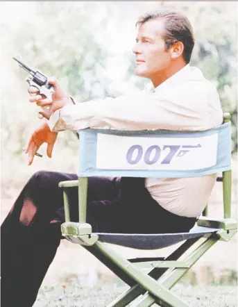  ??  ?? The new book Nobody Does It Better digs into the stories behind nearly six decades of James Bond movies. Actor Roger Moore portrayed 007 a total of seven times, including in 1973’s Live and Let Die.
MGM