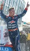  ?? SEAN GARDNER/GETTY ?? Ty Majeski, driver of the No. 66 Road Ranger Toyota, celebrates in victory lane after winning the NASCAR Camping World Truck Series Baptist Health 200 at HomesteadM­iami Speedway on Saturday in Homestead.