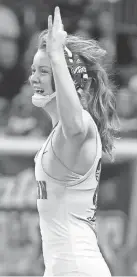  ?? BRYAN TERRY/THE OKLAHOMAN ?? Choctaw’s Peyton Hand celebrates after winning the girls 107-pound championsh­ip on Feb. 26.