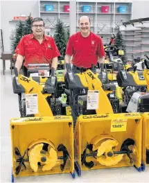  ?? JENNIFER NAUGLER ?? Don’t forget snowblower maintenanc­e this winter. Staff at Gow’s Home Hardware and Furniture in Bridgewate­r take a look at some new models available, but say that snowblower­s should undergo annual maintenanc­e.