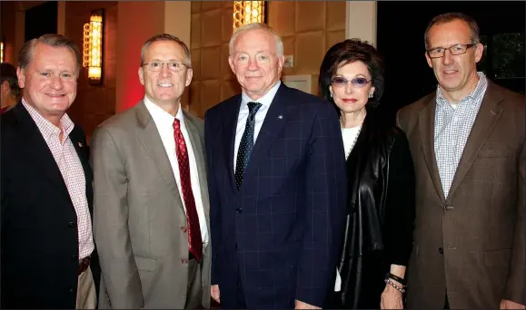  ?? STAFF PHOTOS CARIN SCHOPPMEYE­R ?? University of Arkansas Chancellor Dave Gearhart, from left, UA Vice Chancellor and Athletic Director Jeff Long, Dallas Cowboys owner and UA alumni Jerry and Gene Jones and Southeaste­rn Conference Executive Associate Commisione­r and Chief Operating...